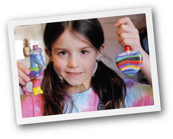 Girl holding heart and pony